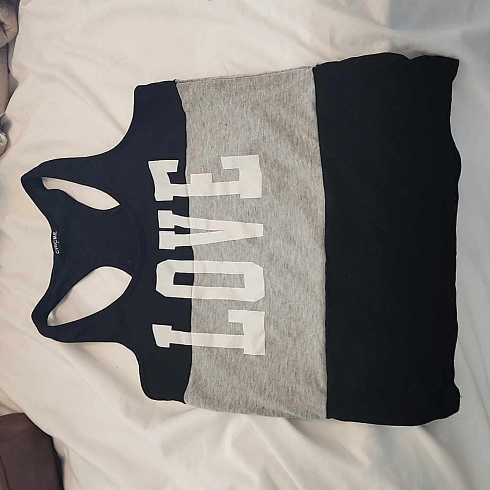 Simple cute size small tank top. Never worn.